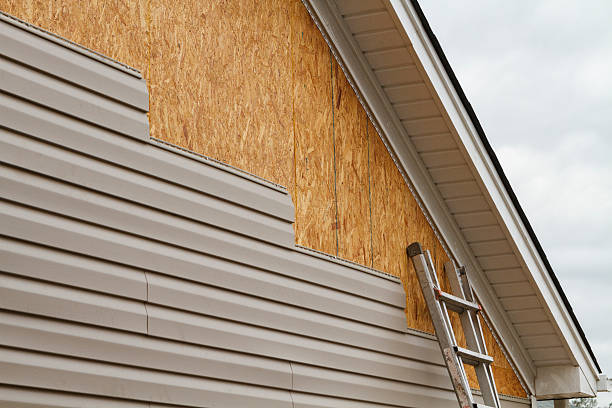 Professional Siding Installation technician working in Mill Hall, PA
